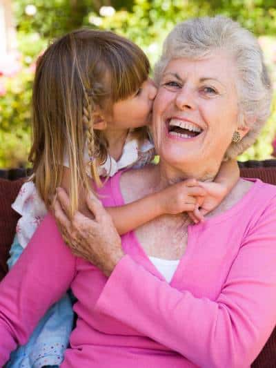 Great granddaughter loving Grandma!